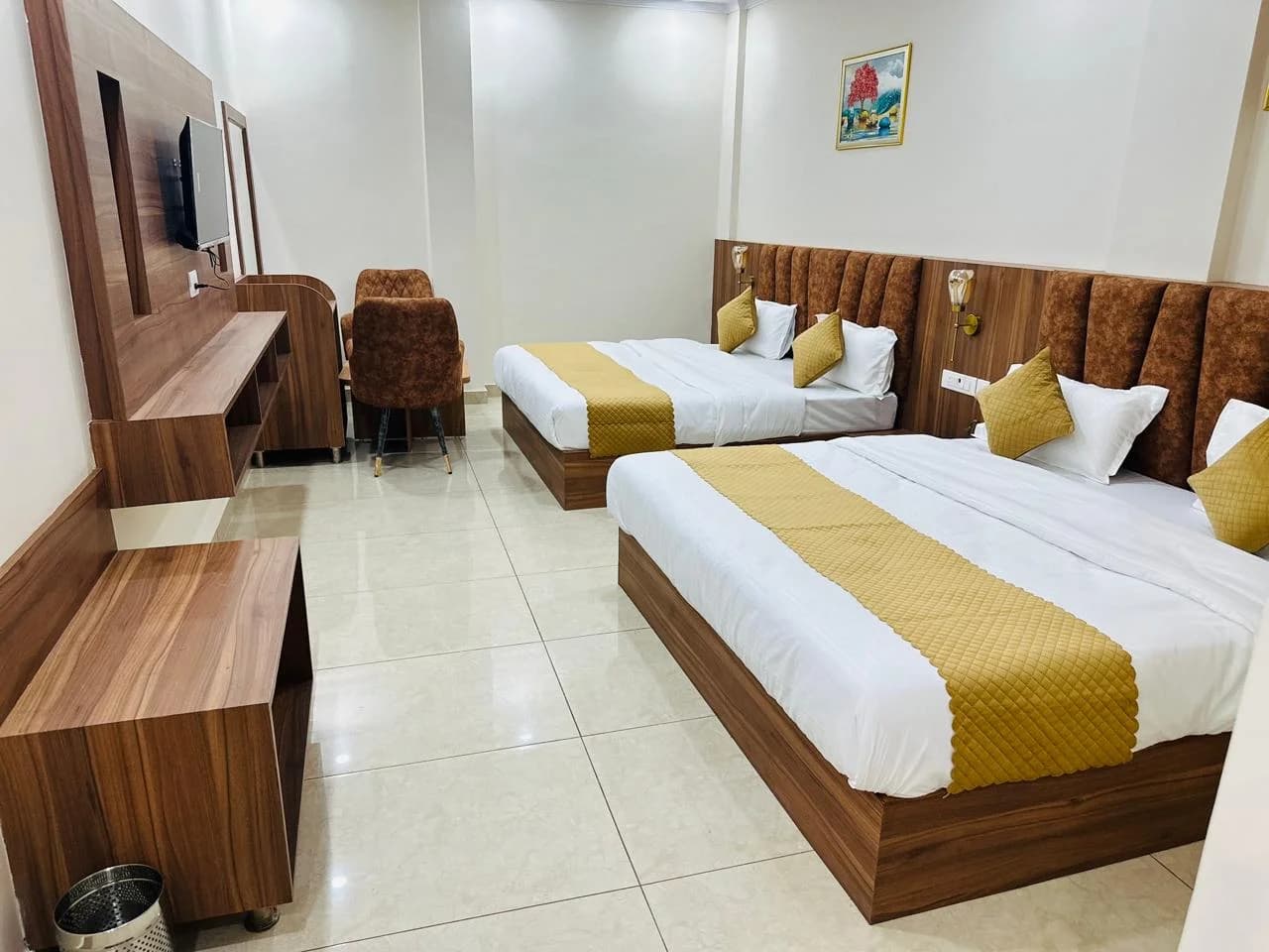 Executive Suite bedroom with refined wooden paneling and plush bed at The Castle View